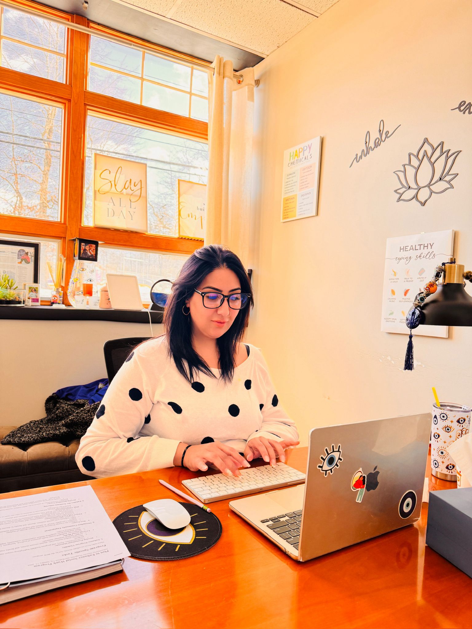 Rubina working at her desk